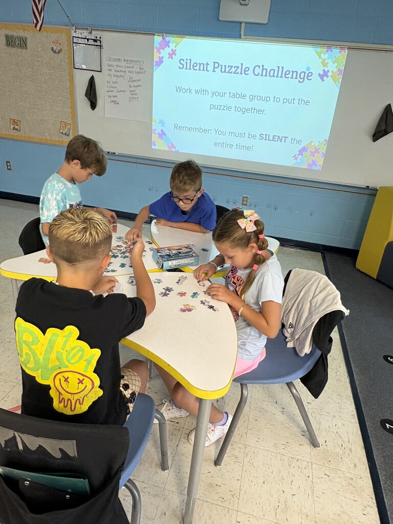 Students working on puzzle