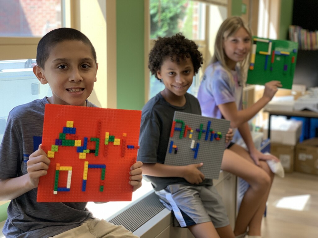 Students with Lego Name Plates