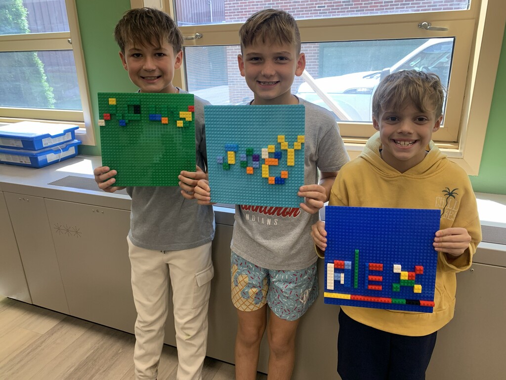 Students with Lego Name Plates