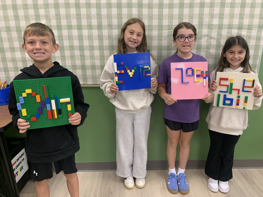 Students with Lego Name Plates
