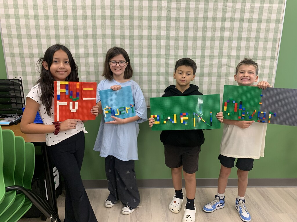 Students with Lego Name Plates