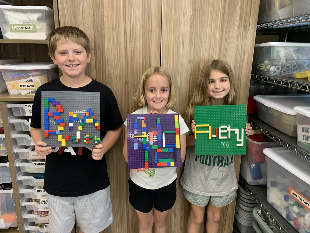 Students with Lego Name Plates
