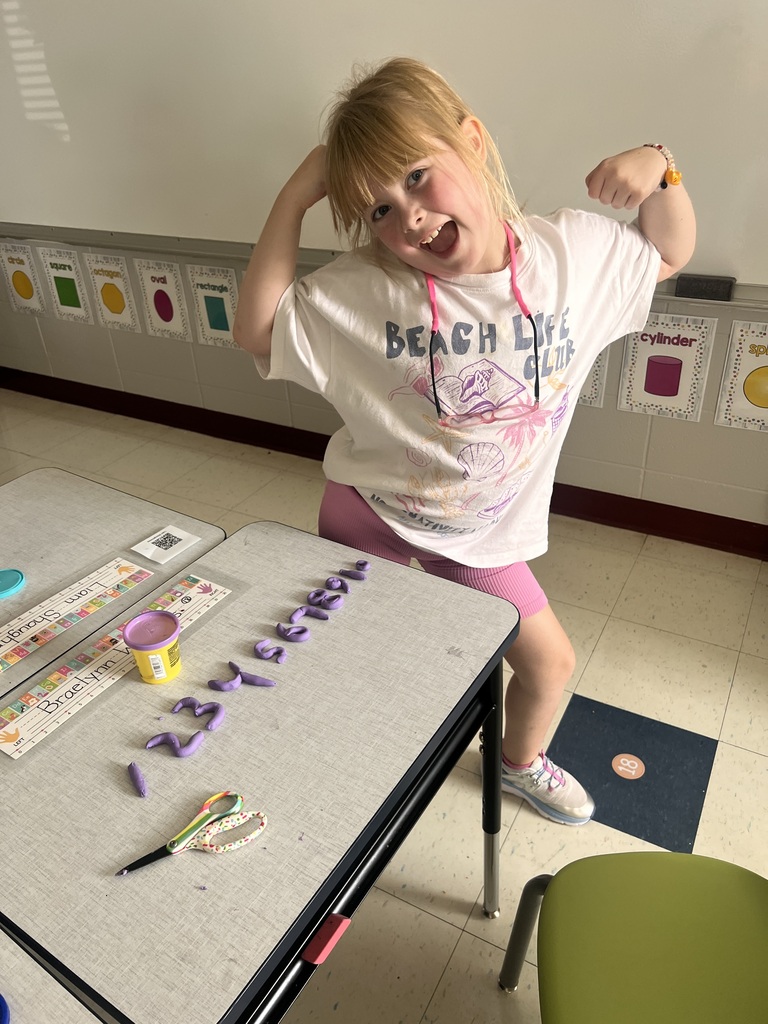 student with Play-doh numbers
