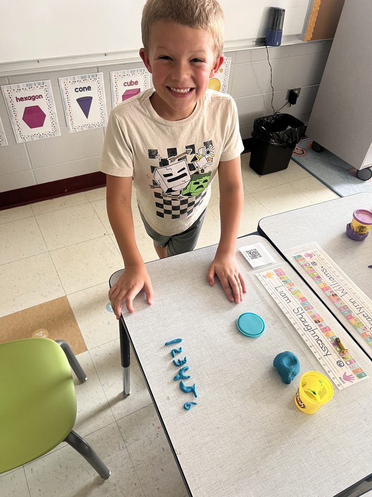 student with Play-doh numbers