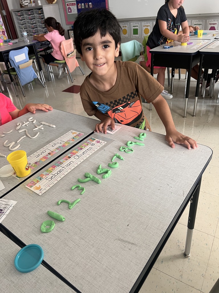 student with Play-doh numbers