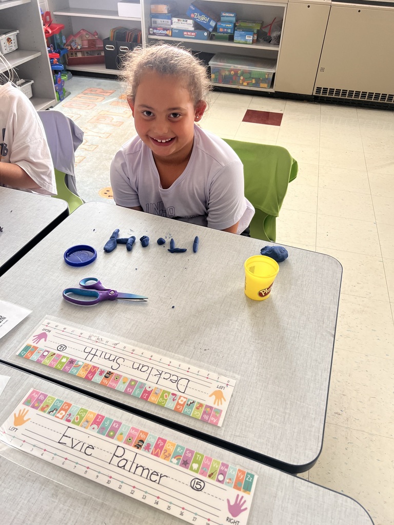 student with Play-doh numbers