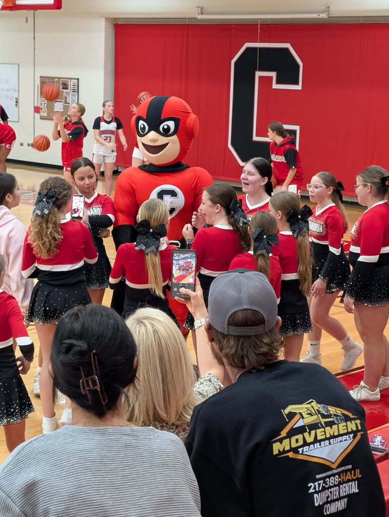 Rowdy with cheer team