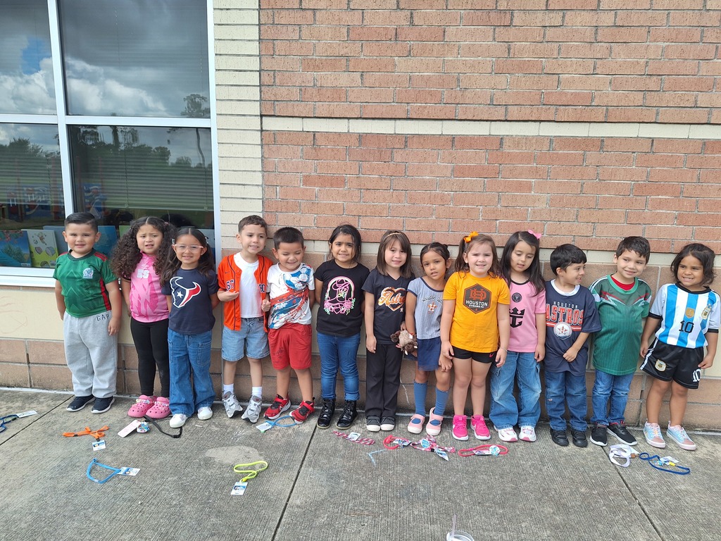 Students wearing sports jerseys for Hispanic Heritage