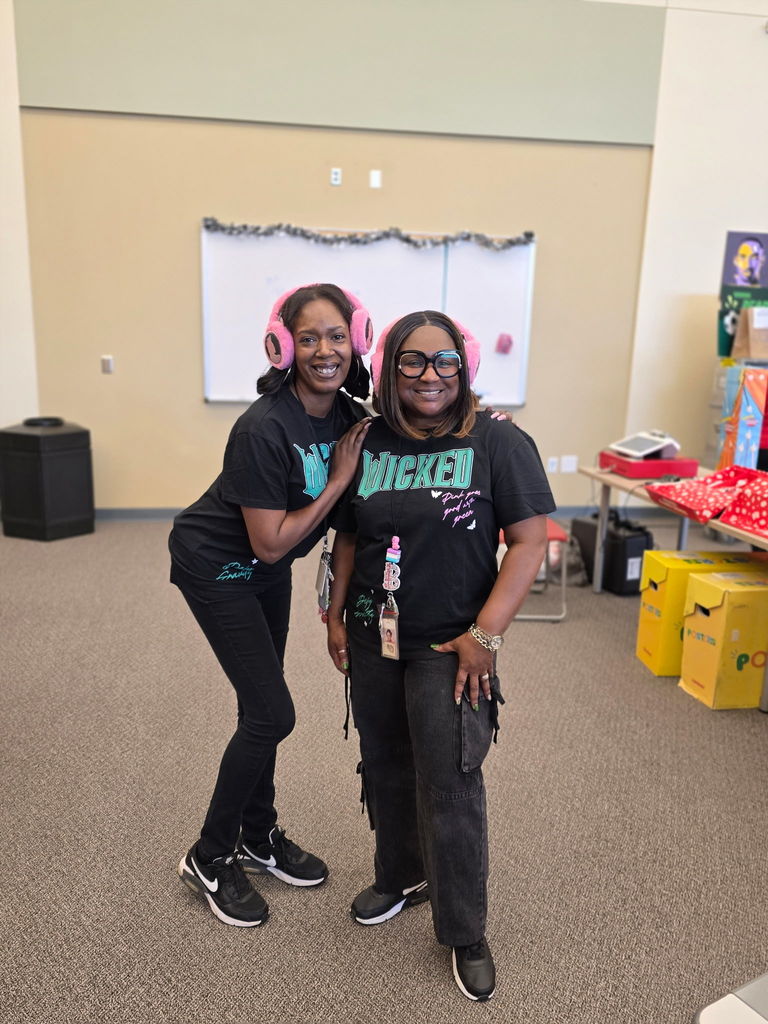 staff dressed alike for twin day