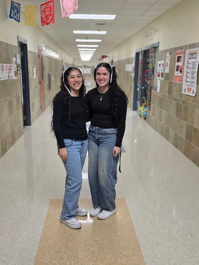 staff dressed alike for twin day