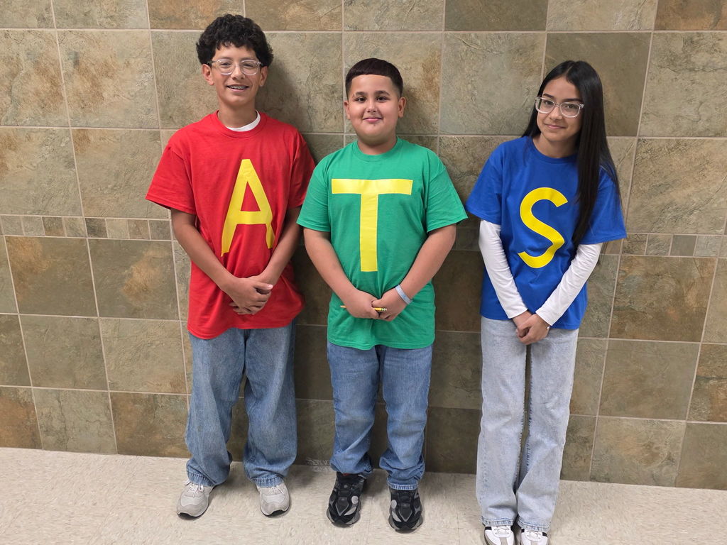 three students matching for twin day