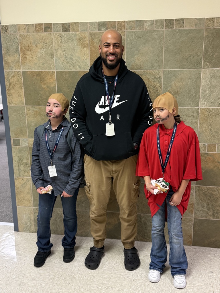 Two students dressed as Mr. Brown for student teacher swap day