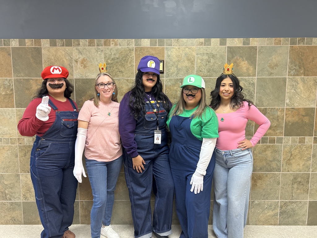 staff dressed up as Super Mario, Luigi, Princess Peach