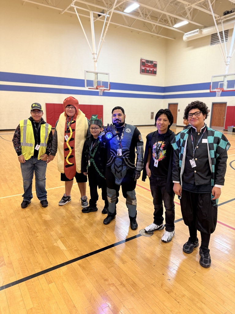 students and staff dressed up for halloween