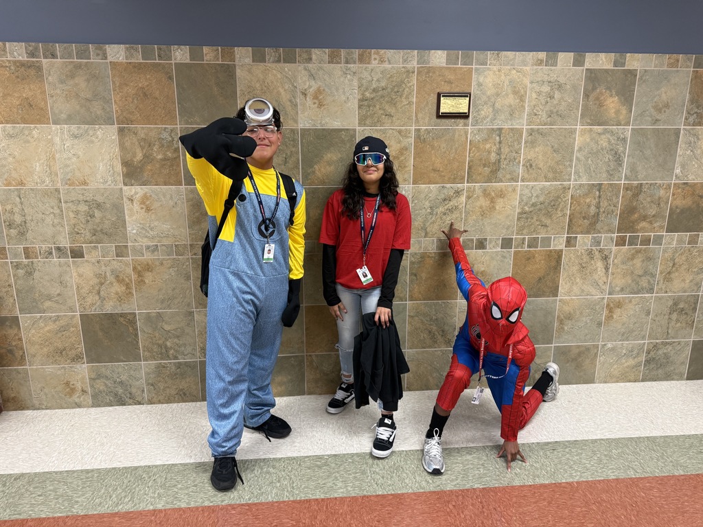 students dressed up as - minion, max (goofy movie) and spiderman