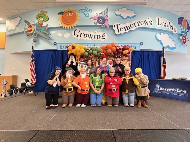Staff Dressed up as characters from Snow White and the Seven Dwarfs