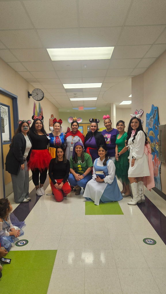 Staff members dressed up for Storybook Character Day