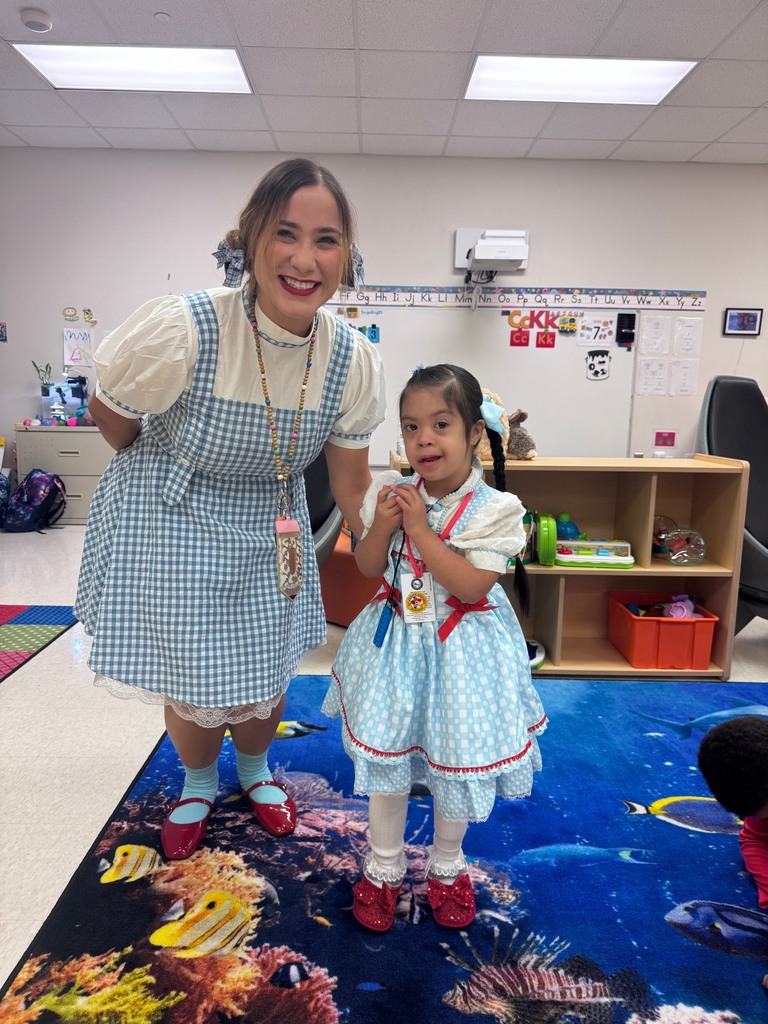 Teacher and student dressed up as Dorothy from Wizard of Oz