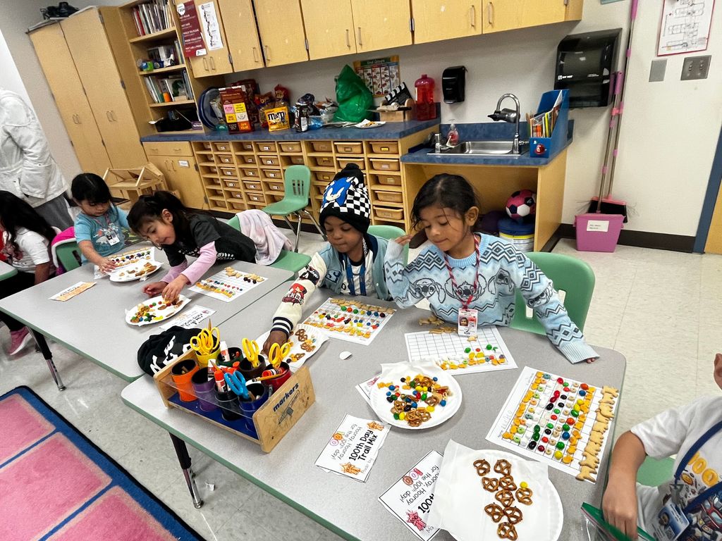 Students participating in 100 days of school activities