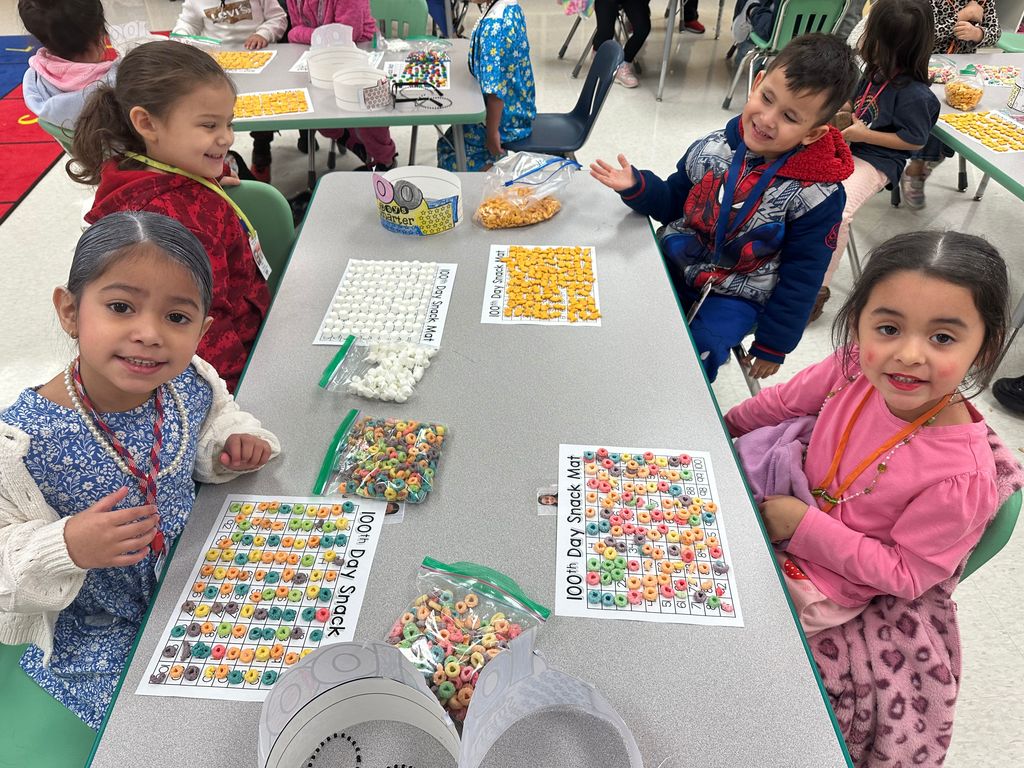Students participating in 100 days of school activities