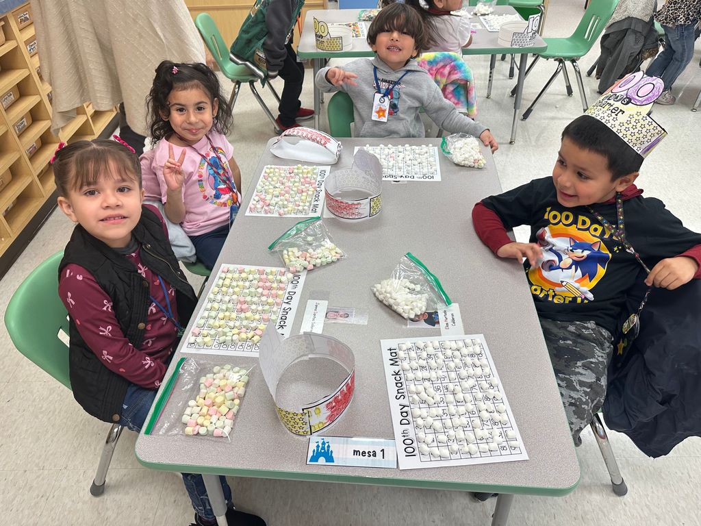 Students participating in 100 days of school activities