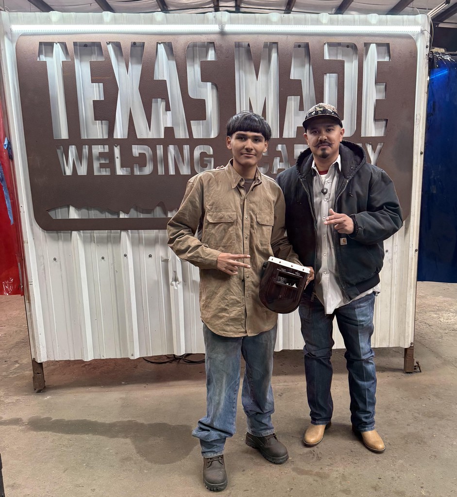 welding teacher and student 