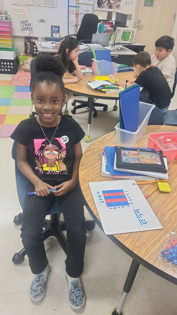 Student working on area in 2nd grade