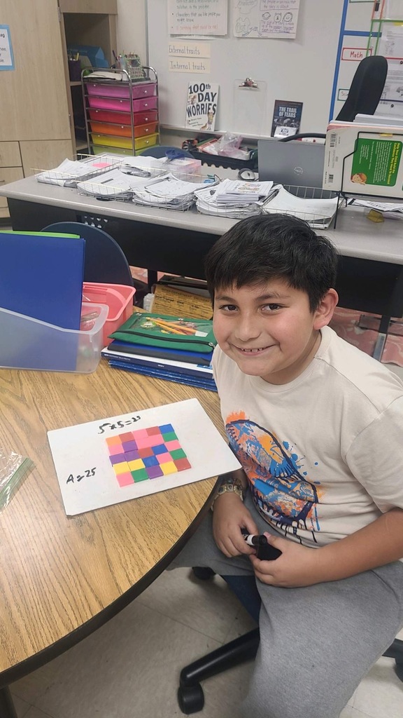 Student working on area in 2nd grade