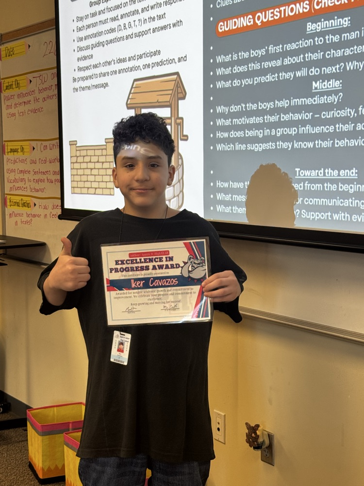 student receiving excellence in progress award in ms. smiths class