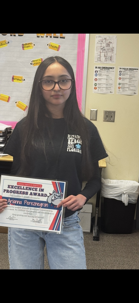 student receiving excellence in progress award in ms. smiths class