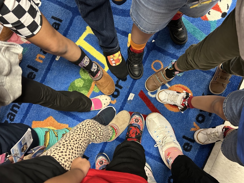 Students and staff wearing crazy socks for Fox in Sox day