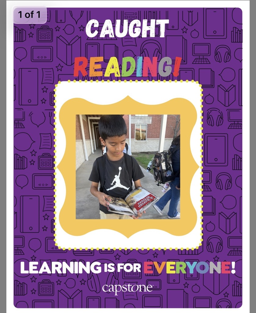 Caught reading picture of student read across America week