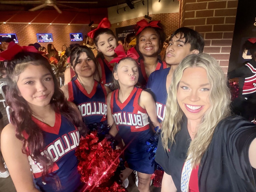 Mrs. Munoz with cheerleaders before the Astros game