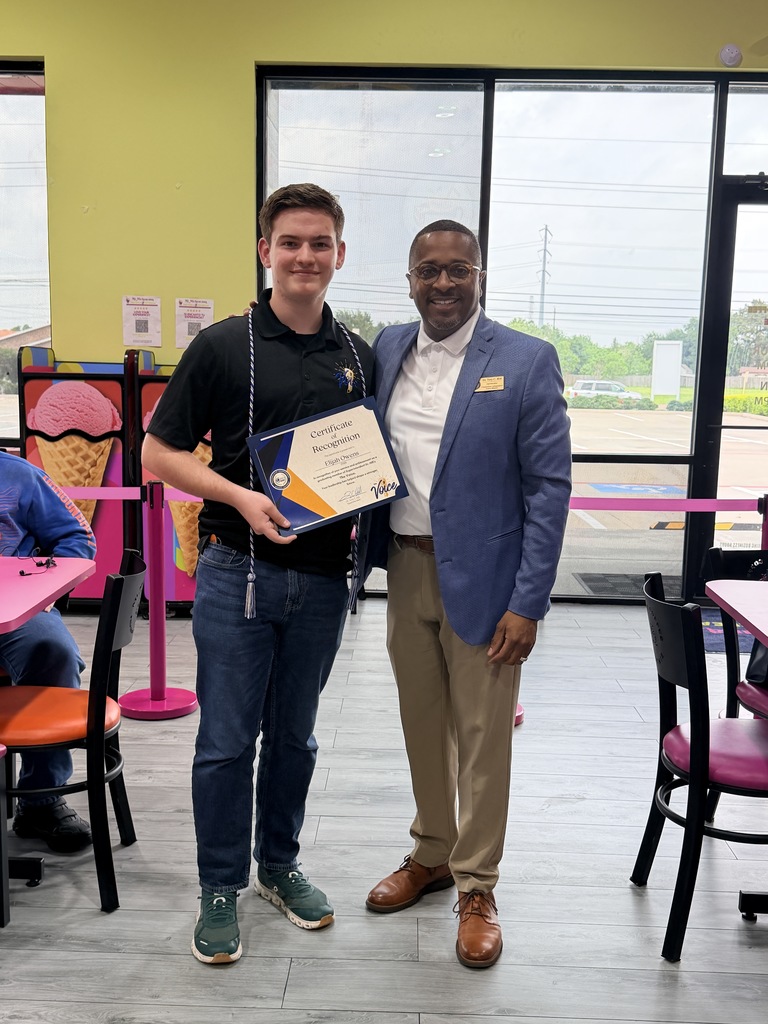 Elijah Owens and Superintendent Dr. Hill