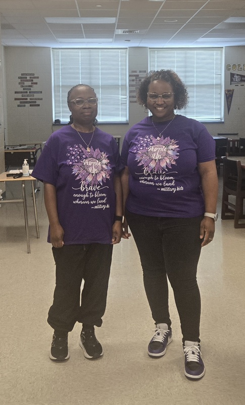 AAJH staff wearing purple shirts for Purple Up Day