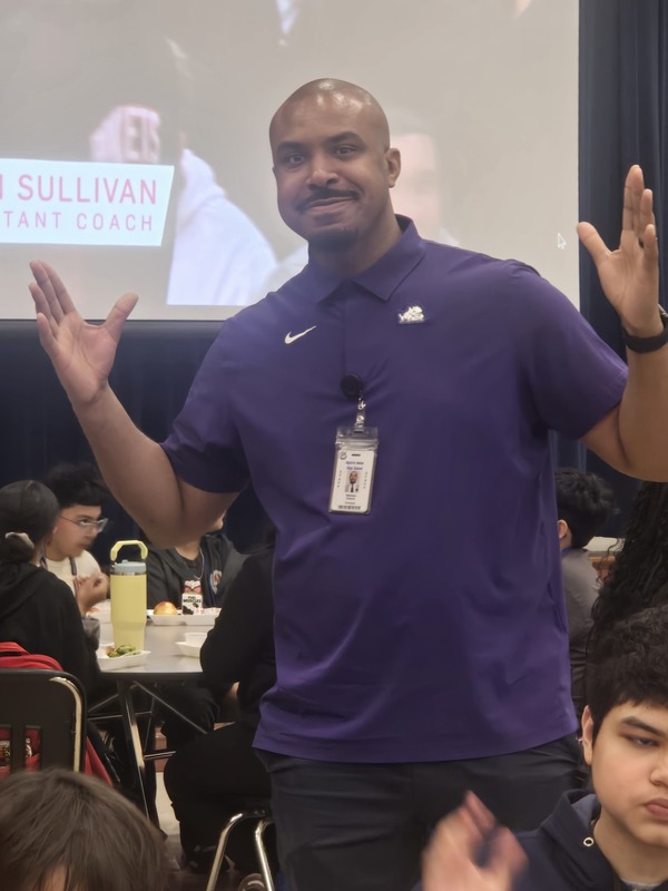 Mr. Owens wearing a purple shirt for Purple Up Day