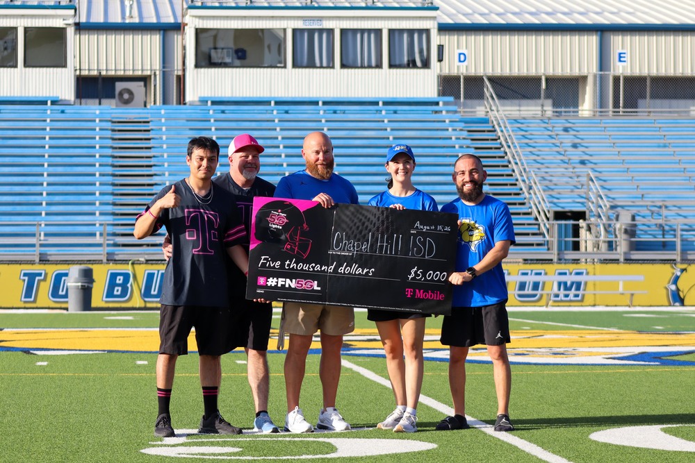 T-mobile presents a check to CHISD