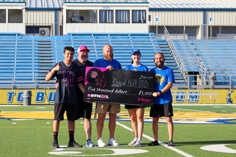T-mobile presents a check to CHISD