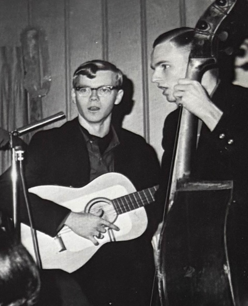 Two students playing instruments