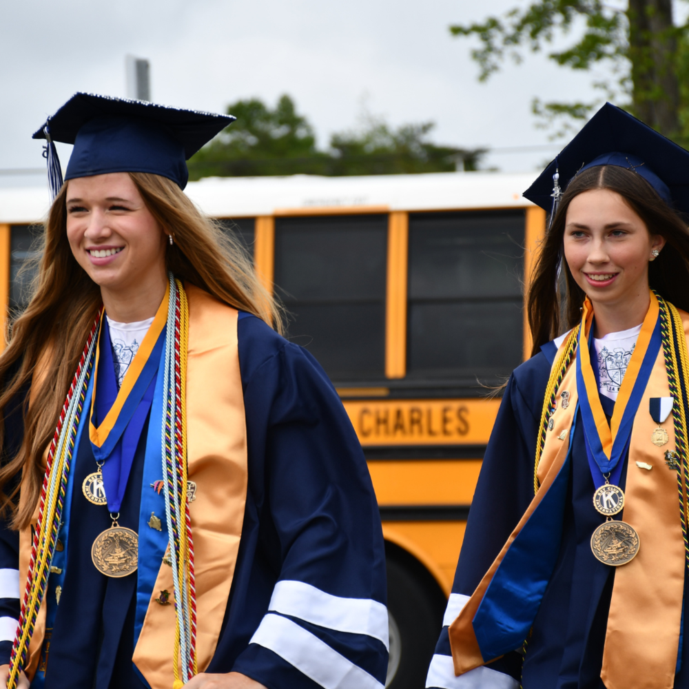 two students graduating