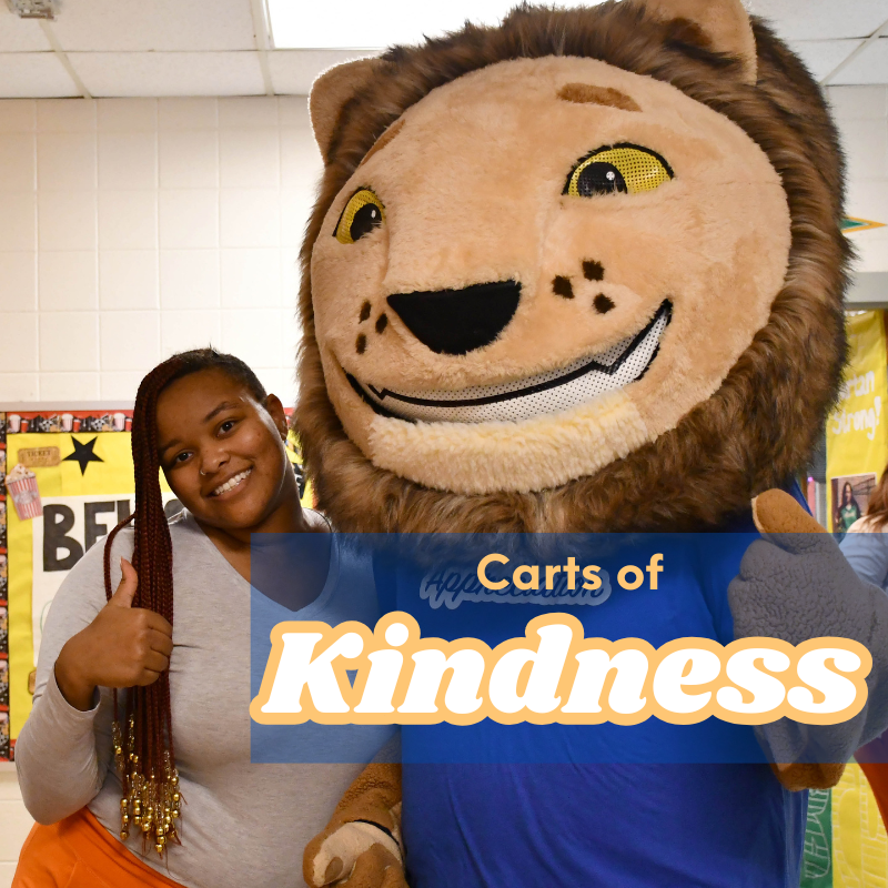 teacher with the wildcat mascot
