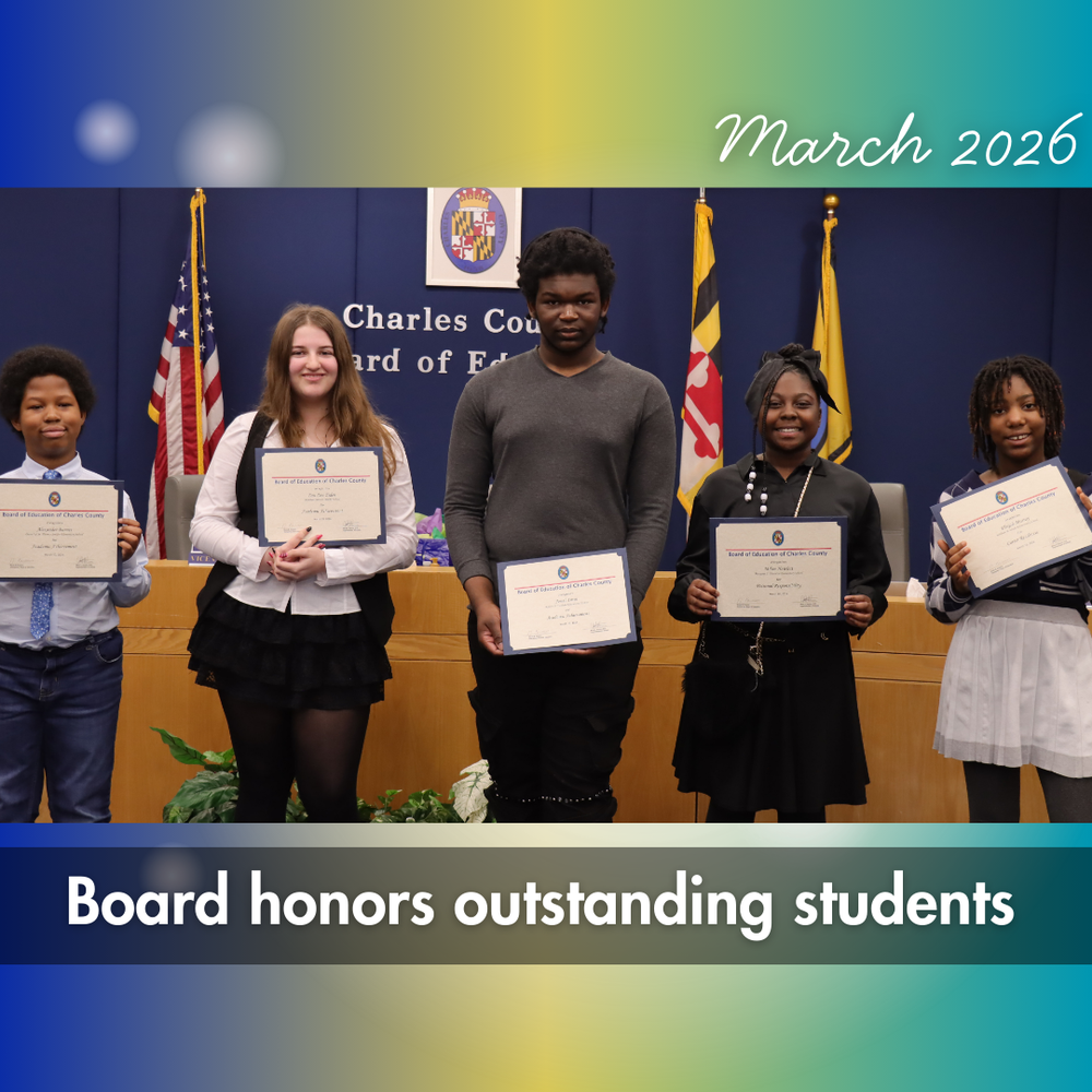 five students holding certificates