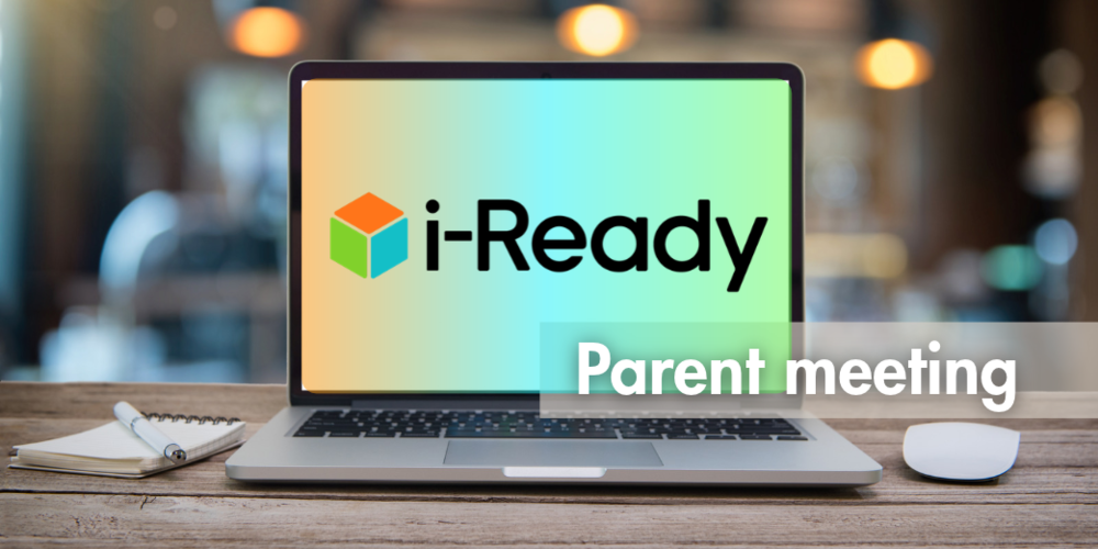 laptop on desk with i-Ready logo on screen