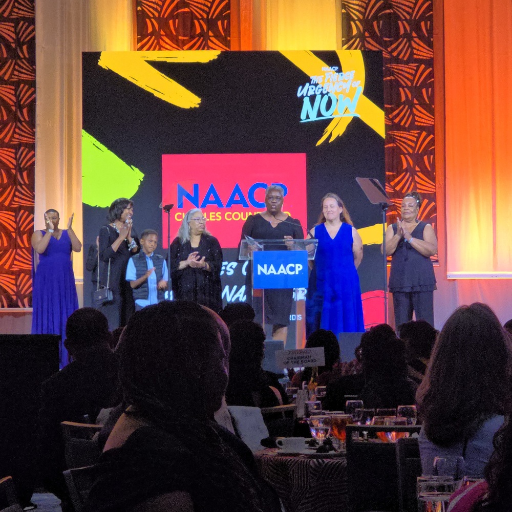 six people on stage