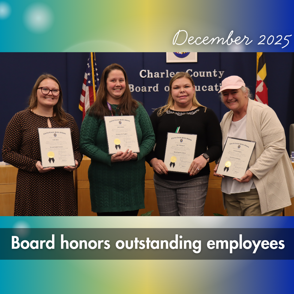 four staff members recieve awards