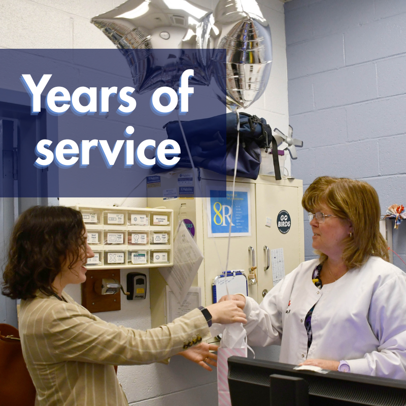 image of nurse accepting balloons