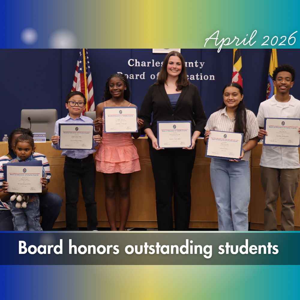 oustanding students holding certificates