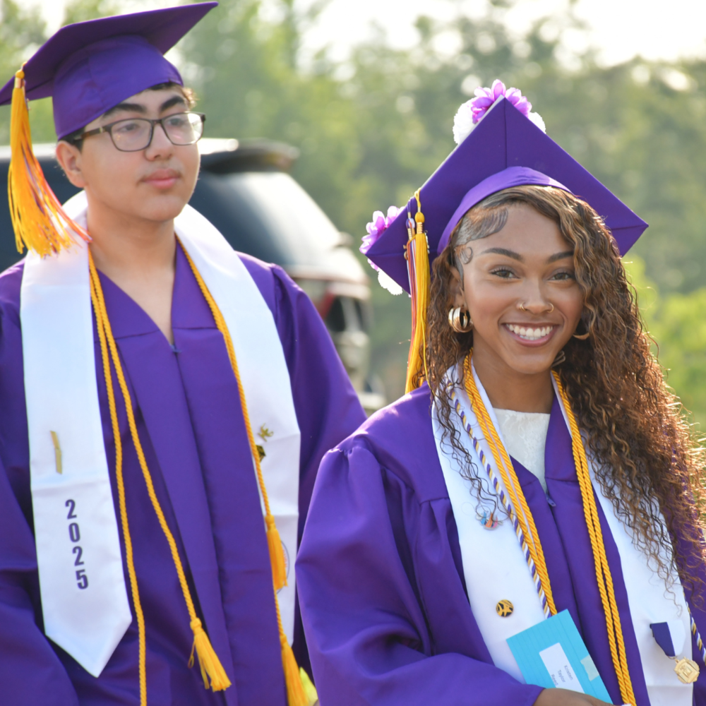 two students graduating