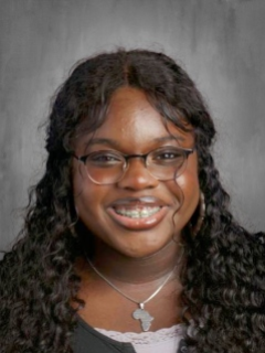 headshot of obinali