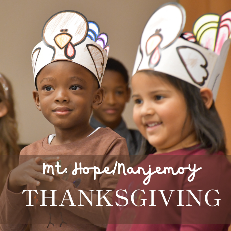two young students celebrating thanksgiving